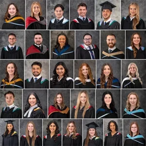 A collage of 40 individual graduation portraits, each featuring a student wearing an academic gown and hood. The photos were taken at Moments in Time Photography Studio, showcasing the students in their formal graduation attire, each with their own unique pose and expression."