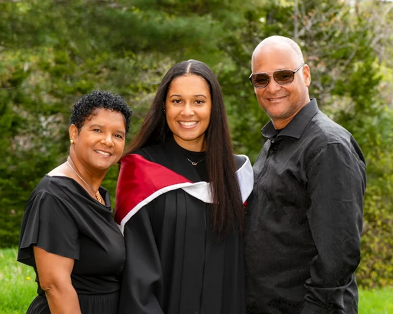 Graduation portrait studio Halifax – proud graduate outdoors with authentic hood