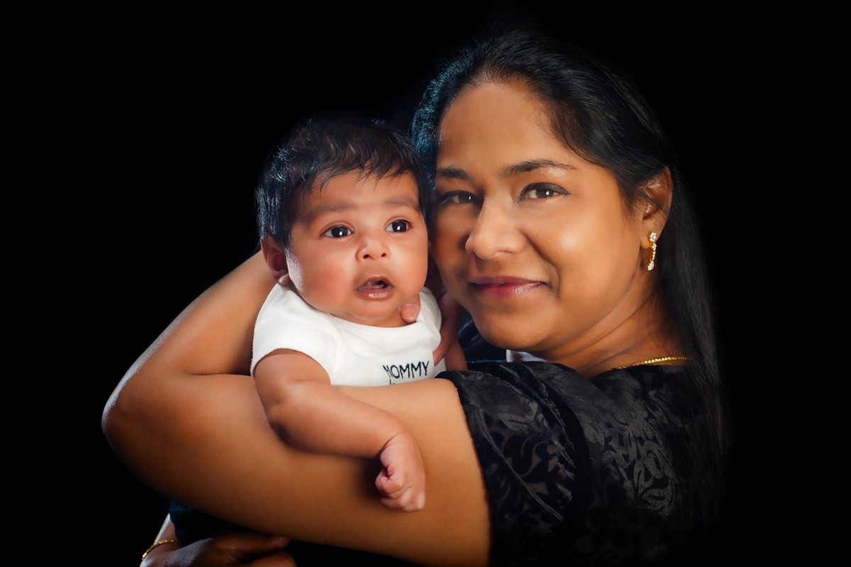 Mommy and Me Session Halifax - Mother hugging baby close in studio