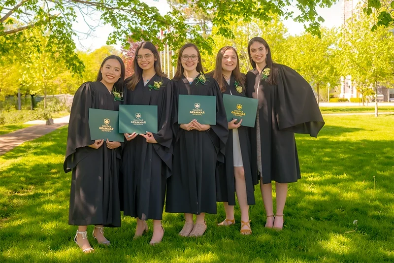 Photo of 5 girls from The Halifax Grammar School in their Graduation gowns taken at the School by Moments in Time Photography Studio