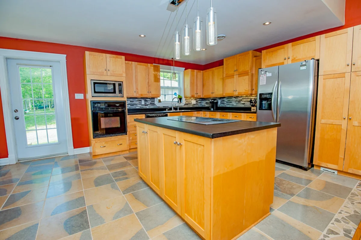 Real Estate Photography 3 Kitchen with wood cabinetry and granite countertops, Halifax real estate photography