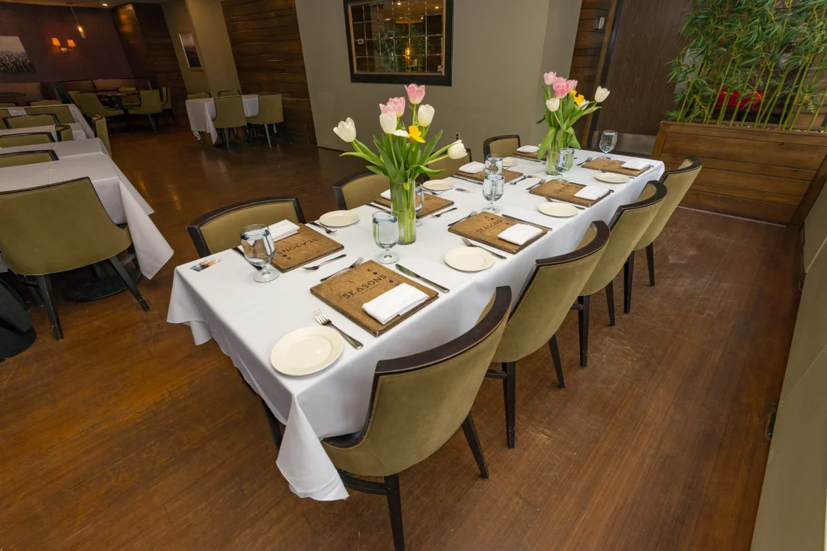 Wedding Photography 6 Elegant intimate wedding reception table set with white linens and tulips at a Halifax restaurant